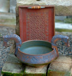 Carved, two headed, Oseberg ale bowl.
